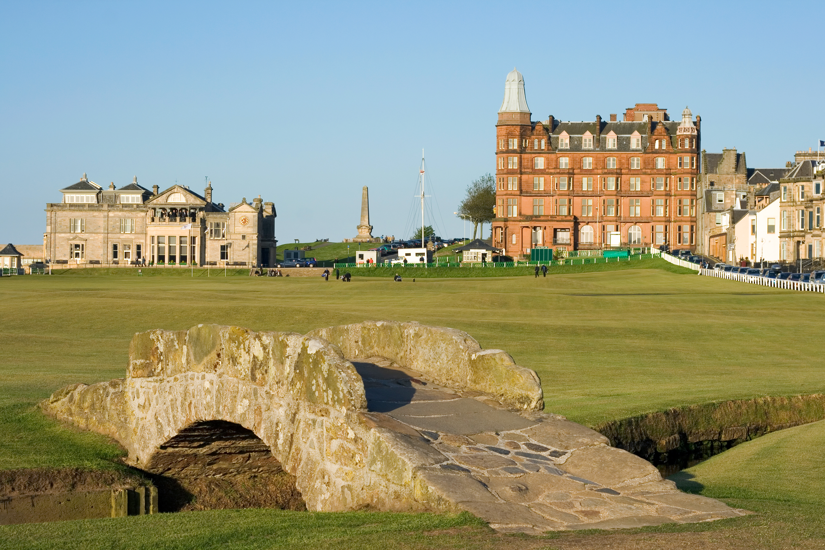 Swilcan Bridge and the Old Course at St Andrews, with the town beyond